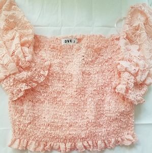 Top size medium, fits like a large, crop top